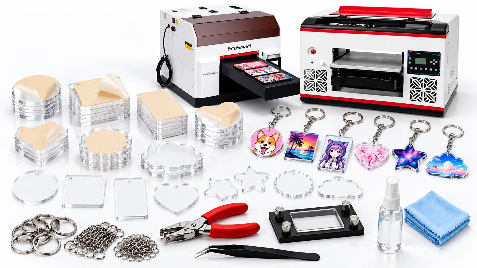 Clear acrylic keychain blanks, rings, tools, cleaning supplies, and sample finished charms arranged for UV printing